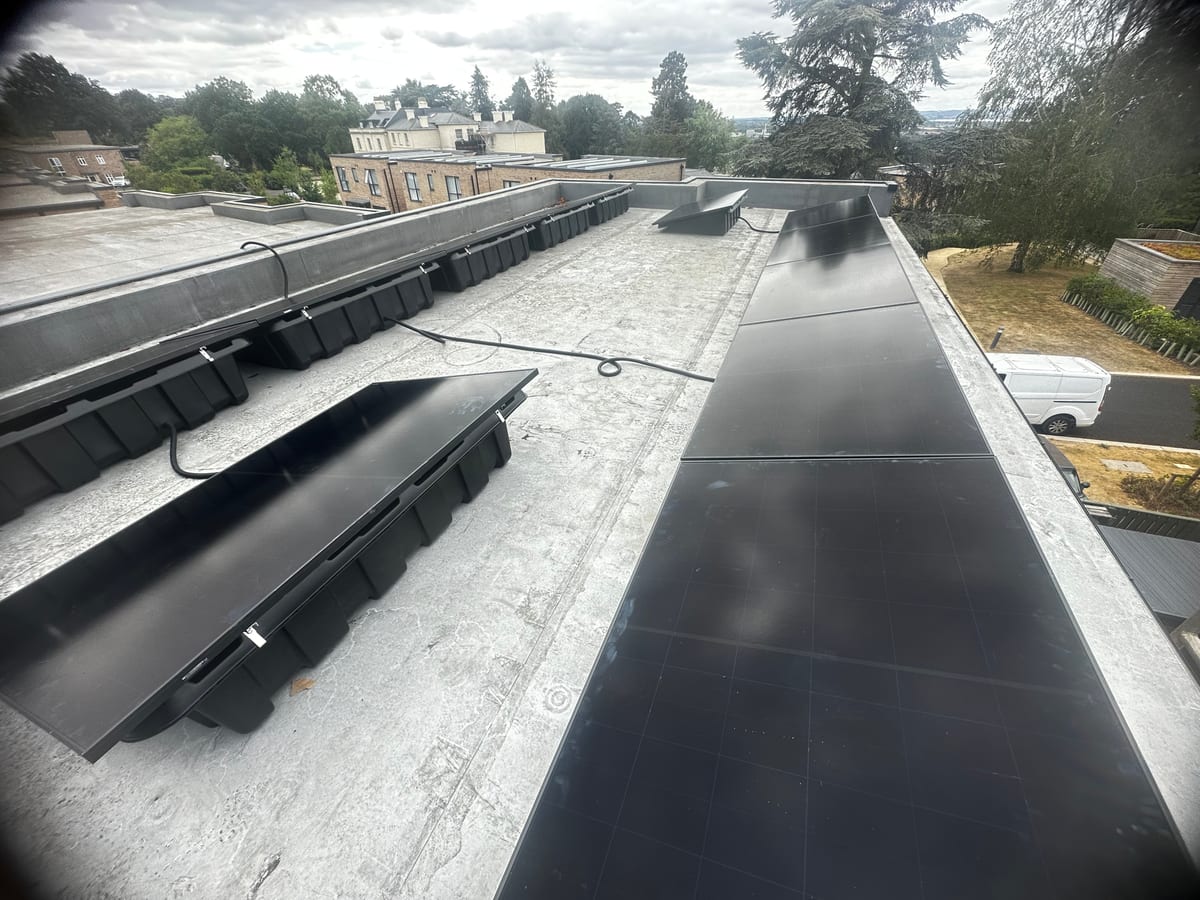 Solar panels installed on a flat roof