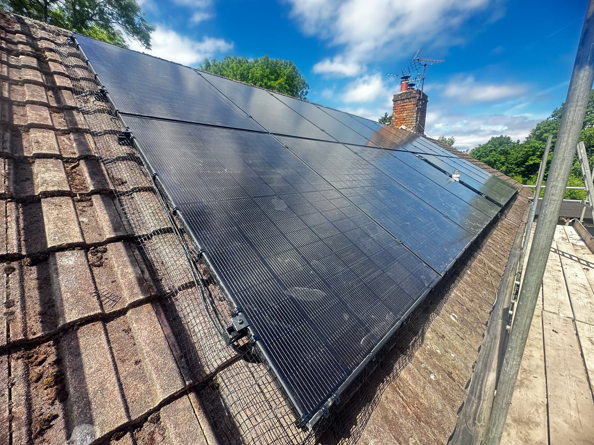 Solar array fitted neatly across a pitched roof